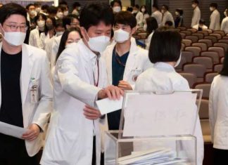 South Korea medical professors resign in protest of government plan in protest of government